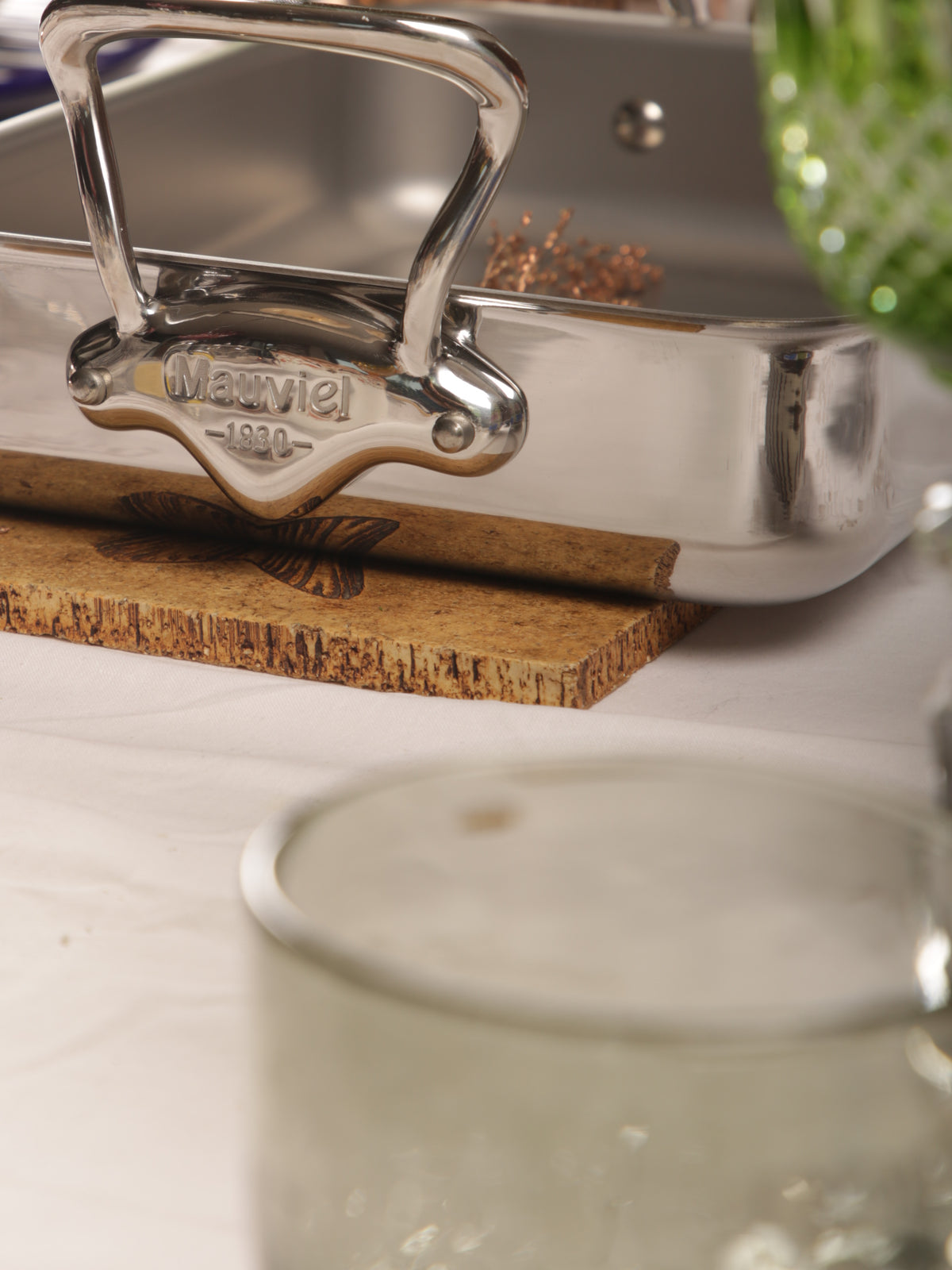 Mauviel stainless steel roasting pan with cast stainless steel handles, measuring 15.7 x 11.8 inches, ideal for oven roasting.