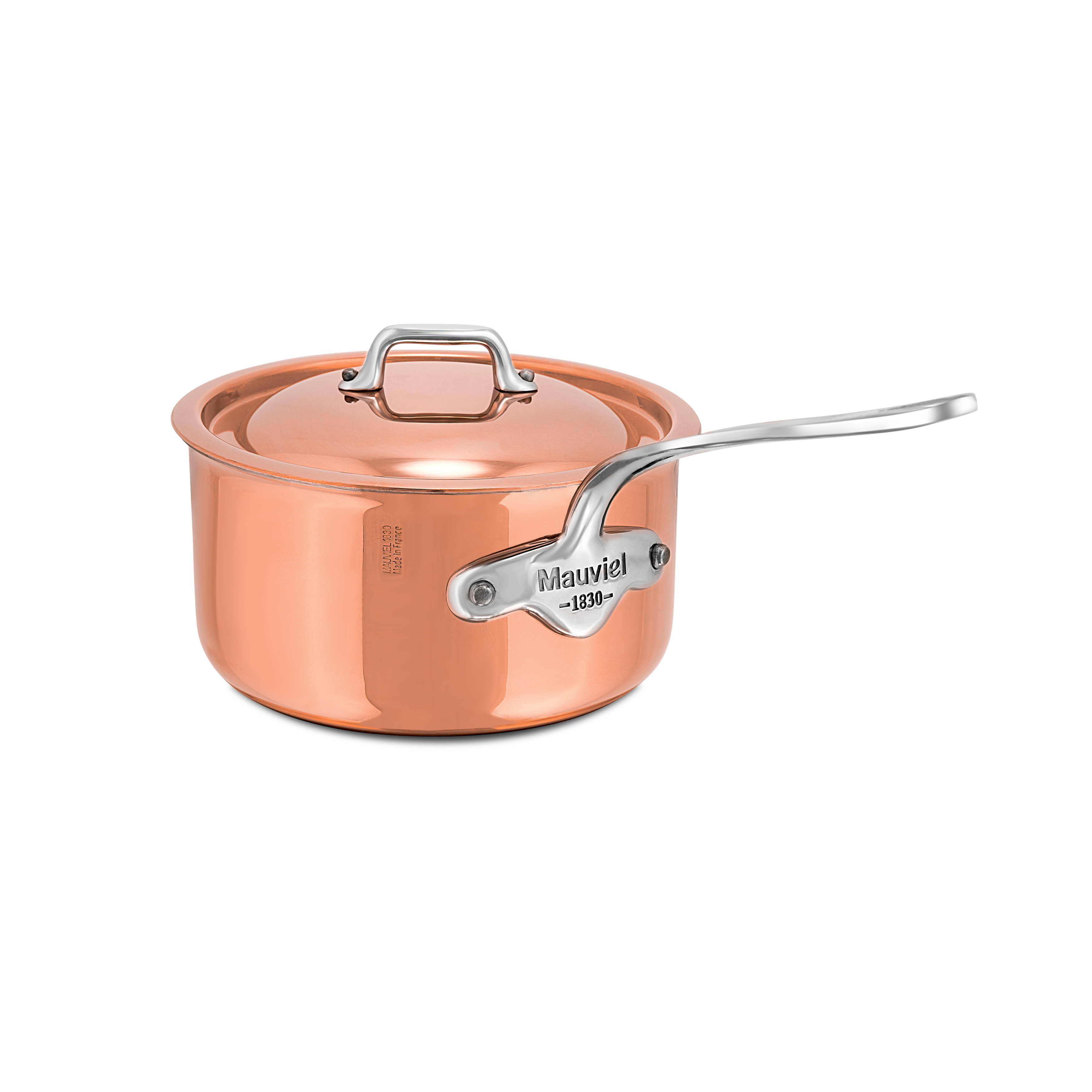 Mauviel M'6 S 12-piece induction copper cookware set with cast stainless steel handles arranged on a kitchen countertop.