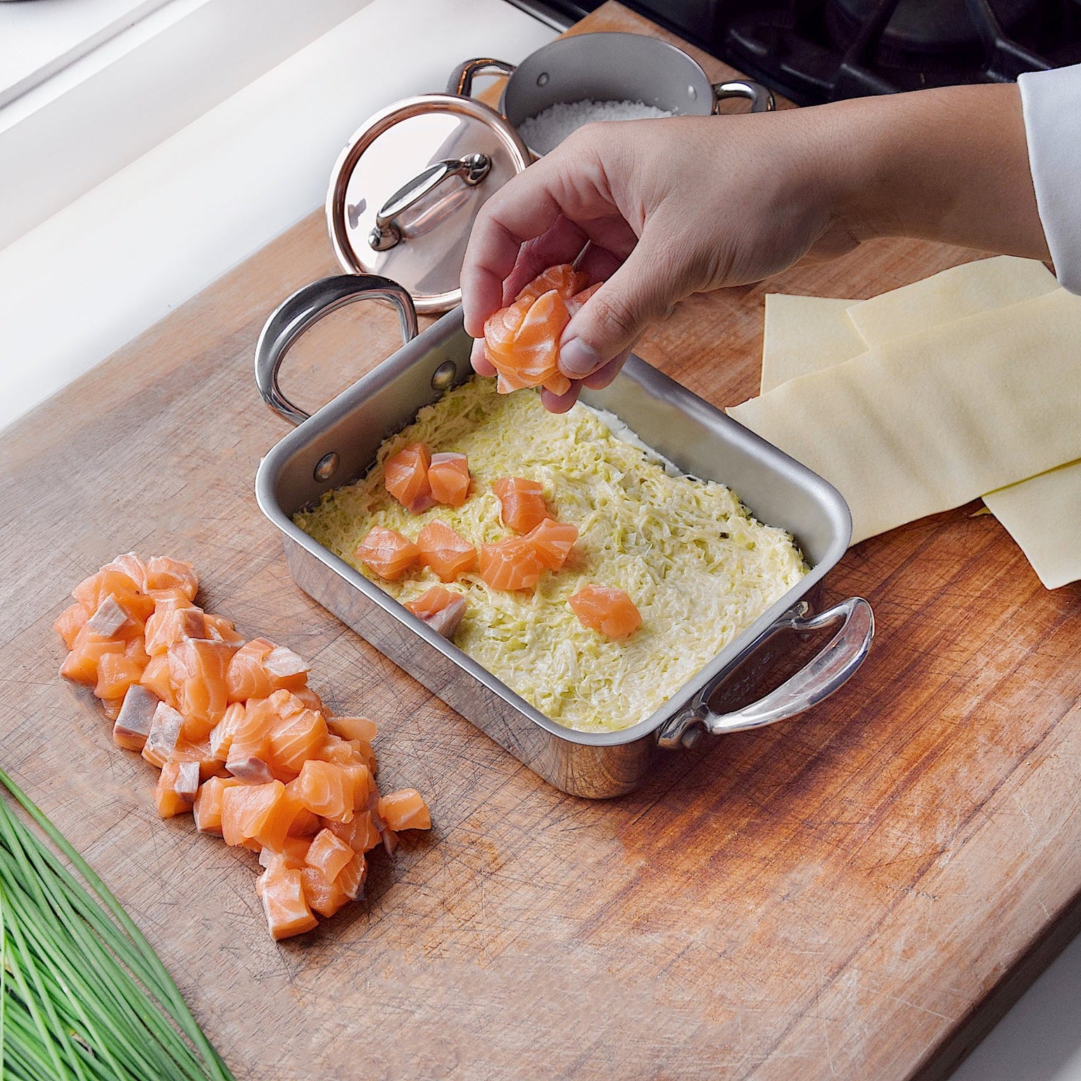 Mauviel M'Minis stainless steel roasting pan measuring 5.5 x 3.9 inches, ideal for small roasted dishes.