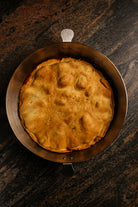 Mauviel M'Passion copper tarte Tatin mold with ears and tin lining, specialty baking mold for caramelized tart preparation.