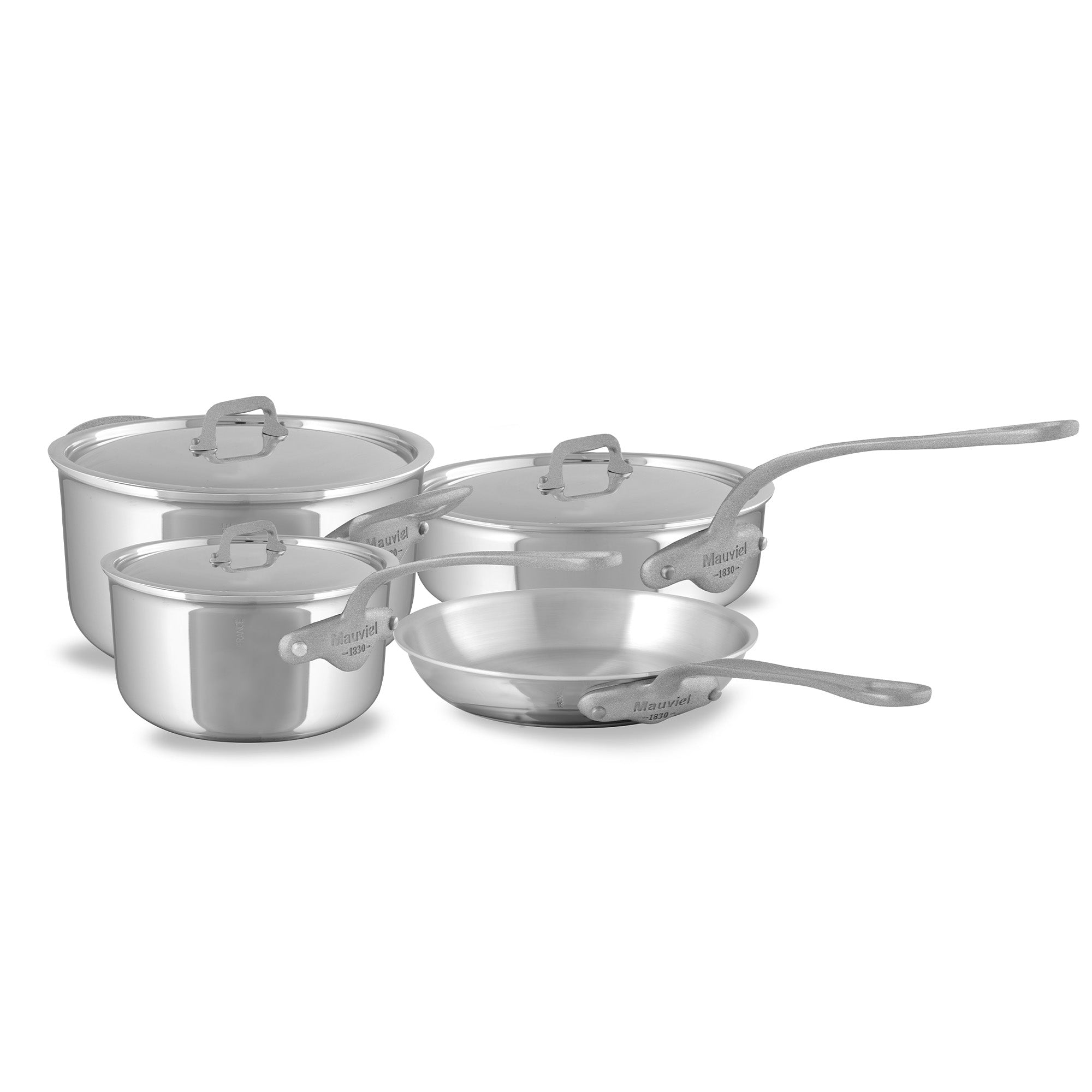 Mauviel M'Cook SB 5-Ply stainless steel 7-piece cookware set with brushed cast stainless steel handles on a kitchen countertop