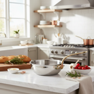 Mauviel M'ELITE B hammered 5-ply chef pan with brass handle, 3.4-quart size, showcasing a durable stainless steel cooking surface.