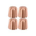 Mauviel M'PASSION copper canele mold set with four tinned copper molds for baking caneles.
