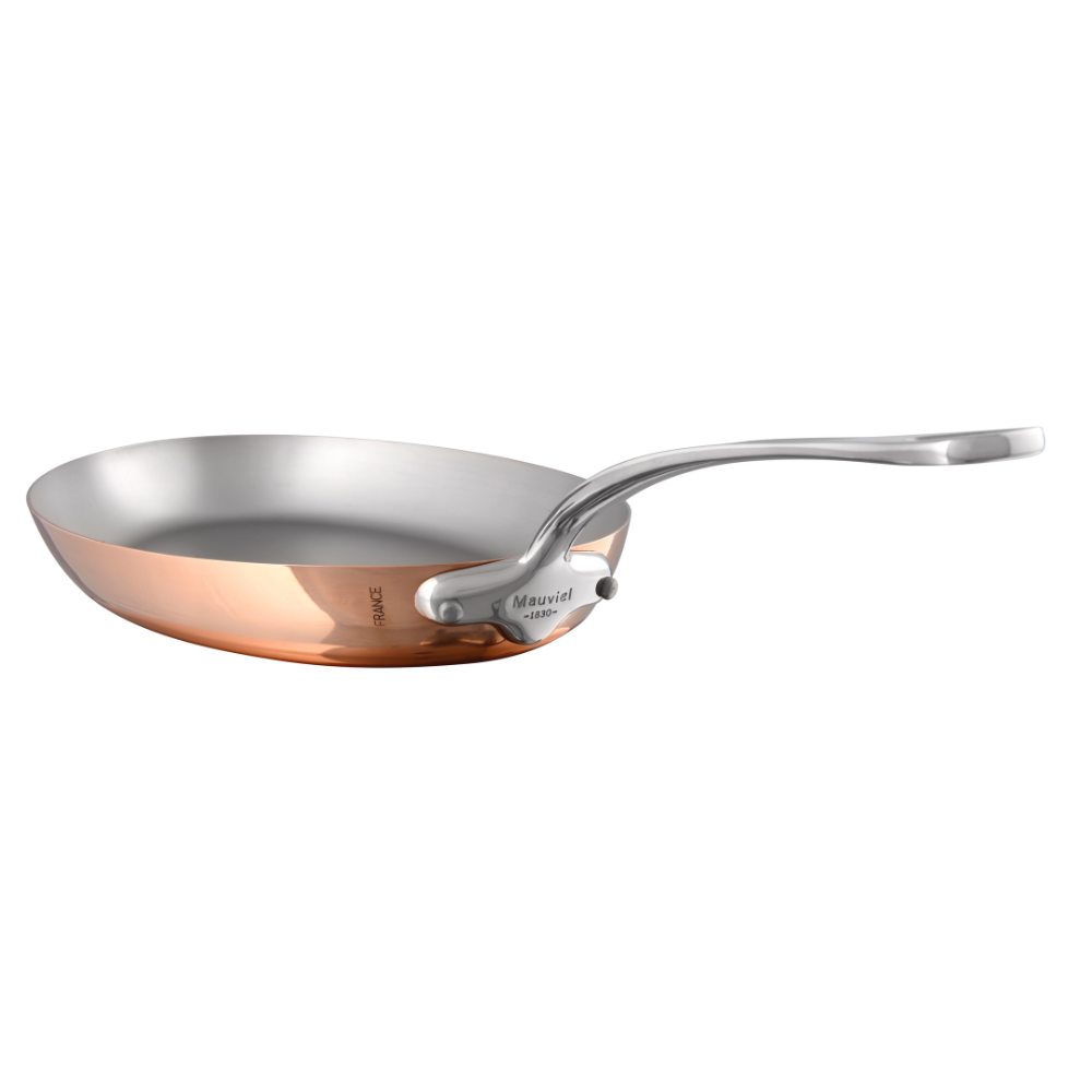 Mauviel M'Heritage M'150 S copper oval frying pan with cast stainless steel handle, 13 x 9 inches, for even cooking.