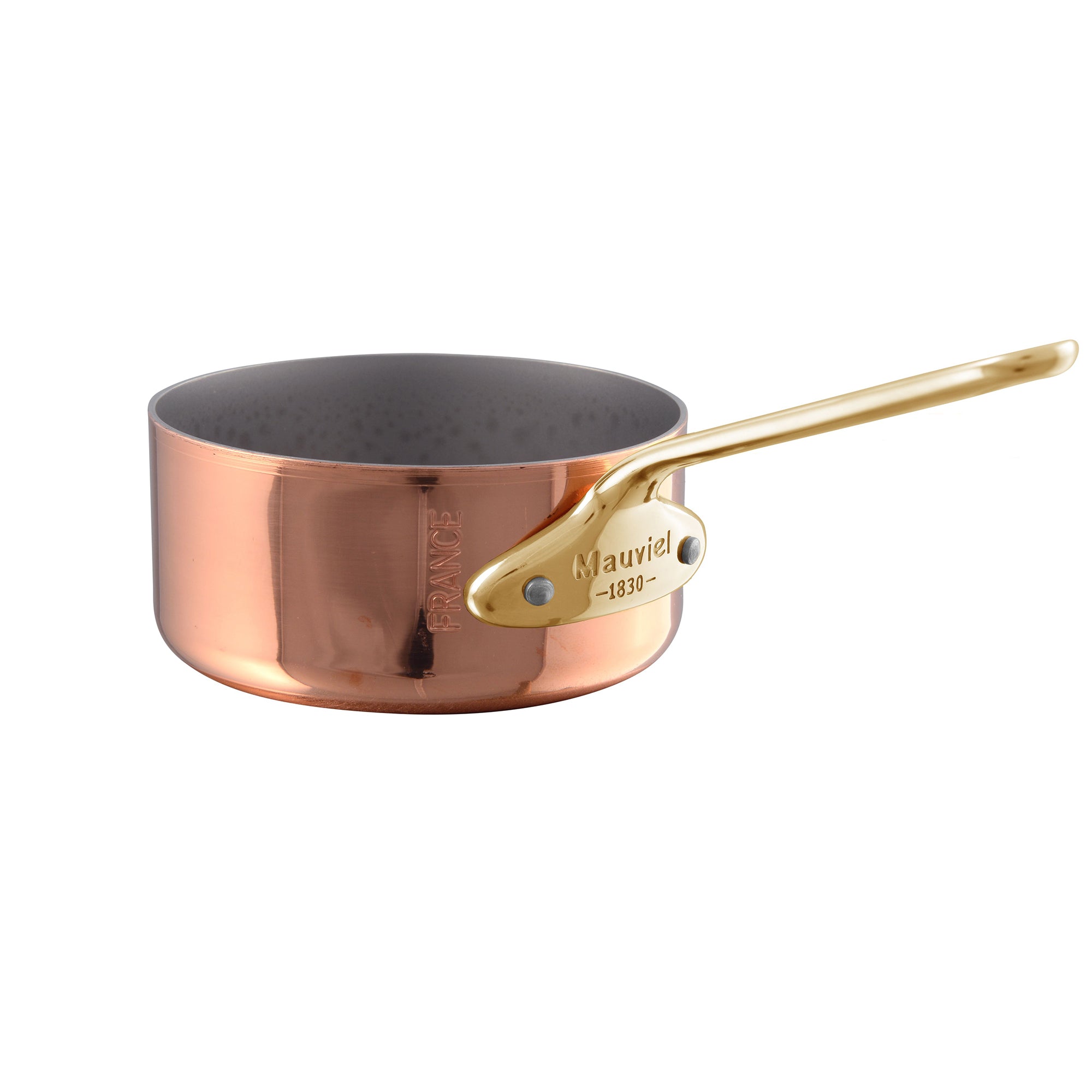 Mauviel M'MINIS copper saute pan with brass handle, 0.26-quart size, showcasing shiny copper surface and sturdy handle.