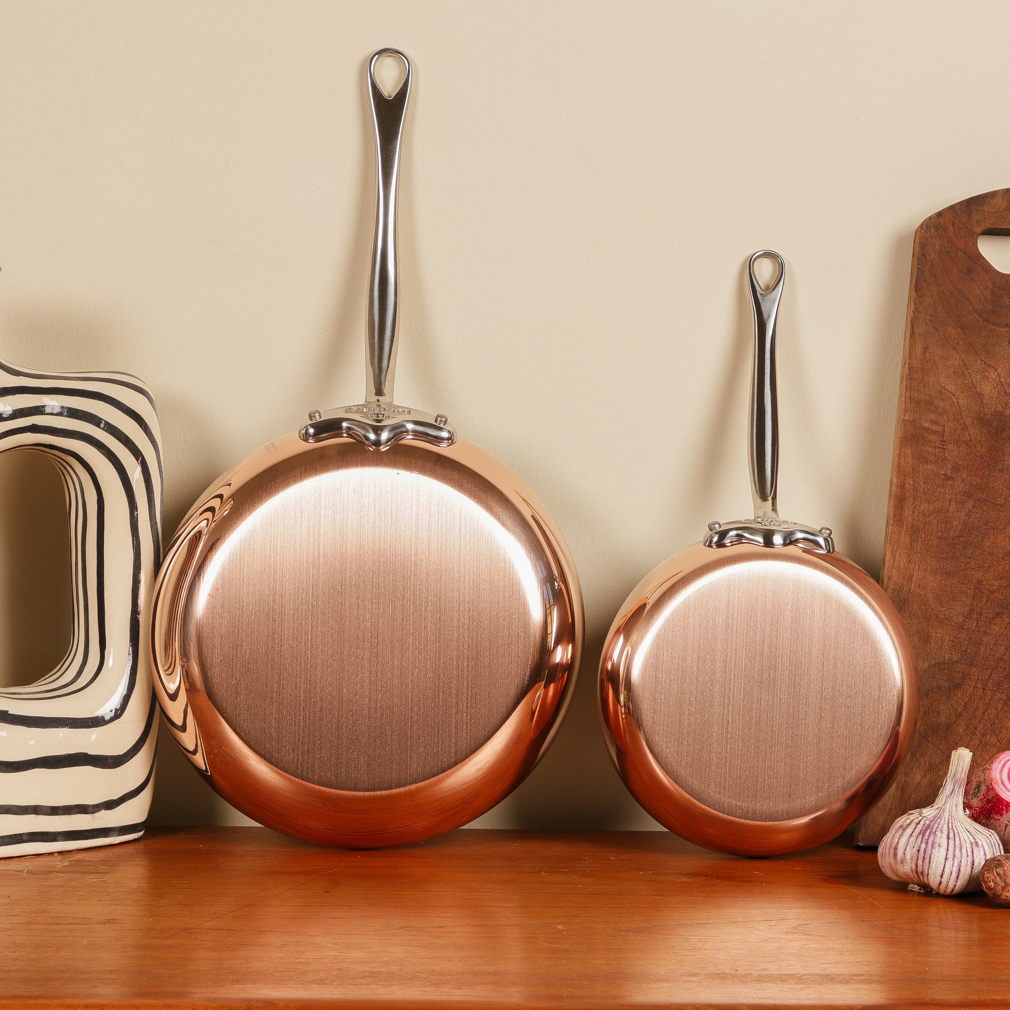 Mauviel M'Heritage M'150 S copper crepe pan with cast stainless steel handle, 11.8-inch frying pan on stovetop