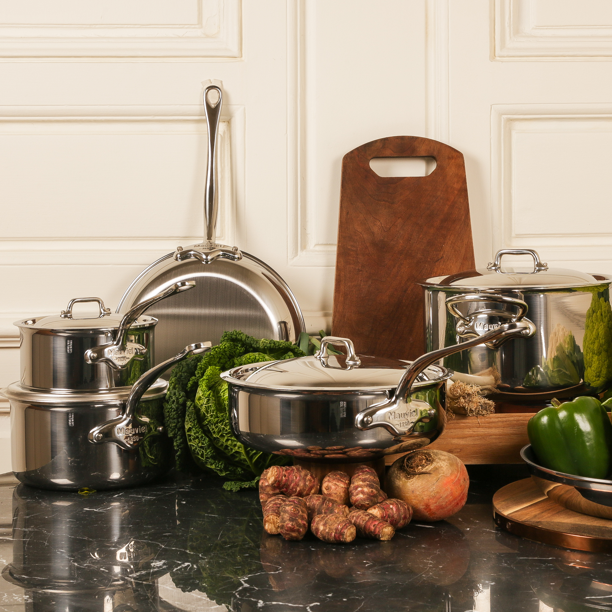 Mauviel M'COOK 5-ply stainless steel saute pan with lid and helper handle, 6.2-quart capacity, cast stainless steel handle.