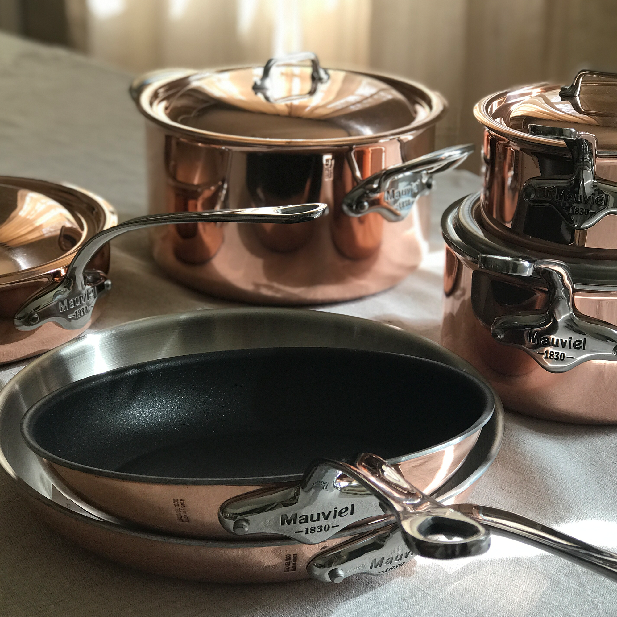 Mauviel M'6 S induction copper sauté pan with lid, cast stainless steel handle, 2.1-quart chef pan for cooking.
