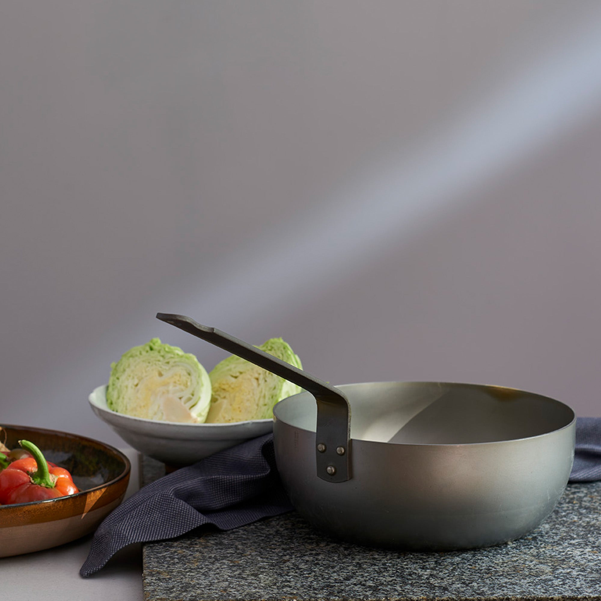 Mauviel M'STEEL black carbon nonstick 3-piece frying pan set with iron handles, cookware set for versatile cooking.
